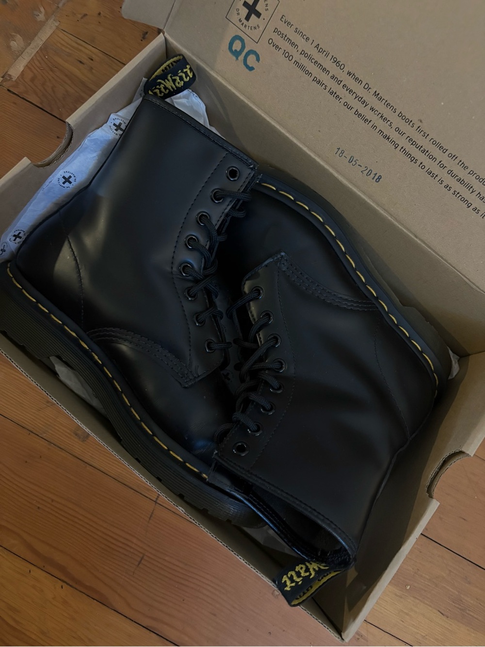 Dr. Martens Black Leather 8-Eye Boots with Yellow Stitching